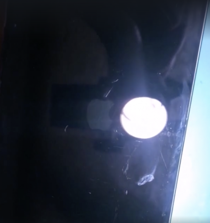 iphone screen lights up by itself